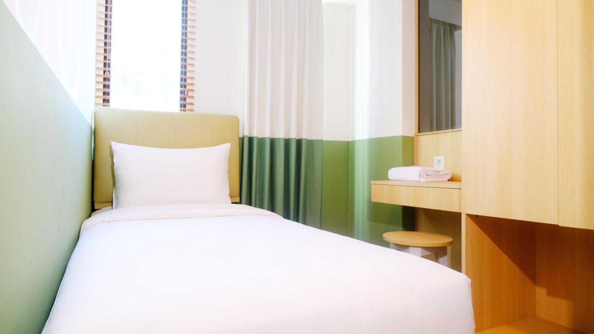 Hotel Osaka Pik2 Тангеранг Экстерьер фото